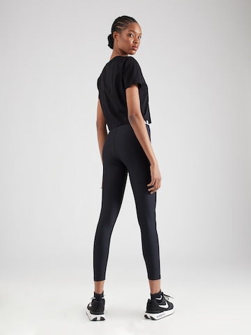 Skinny Pantalon de sport 'Authentics' UNDER ARMOUR en noir