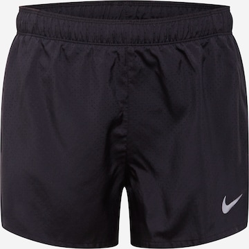 Regular Pantalon de sport 'FAST' NIKE en noir : devant