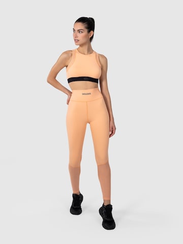 Smilodox Skinny Sporthose 'Karlie' in Orange