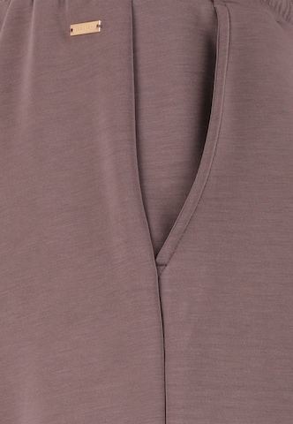 Athlecia Tapered Sports trousers 'Jacey' in Brown