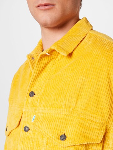 LEVI'S ® Between-season jacket 'XSimpsons Trucker' in Yellow
