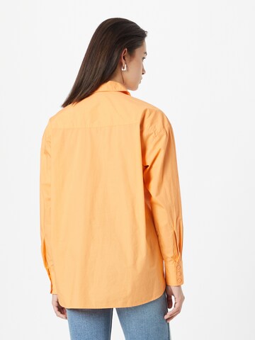 QS - Blusa em laranja