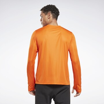 Reebok Функциональная футболка в Оранжевый