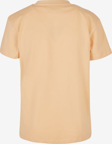 Karl Kani Shirts i orange