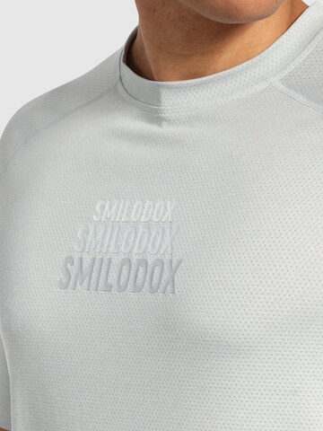 T-Shirt ' Powerfit Triple ' Smilodox en bleu