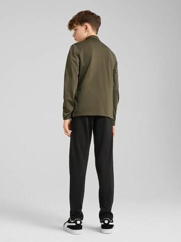 PUMA Joggingpak in Groen