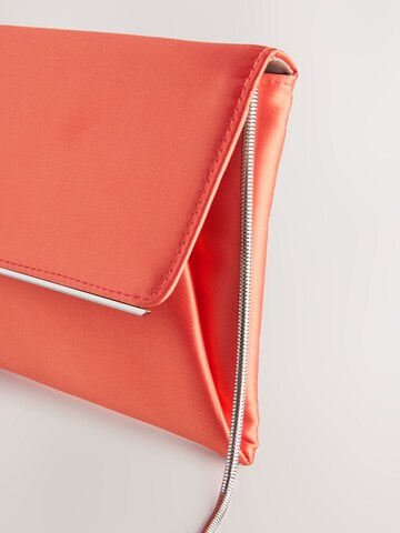 Pochette di Next in arancione