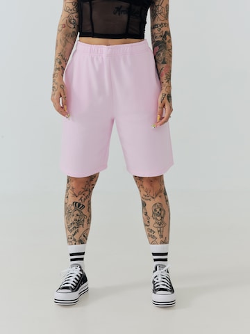 ABOUT YOU x Sharlota Regular Pants 'Tessa' in Pink: front