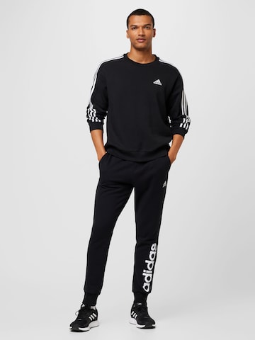 ADIDAS SPORTSWEAR Tapered Sports trousers 'Essentials' in Black