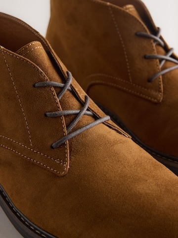 Next Chukka boots in Brown