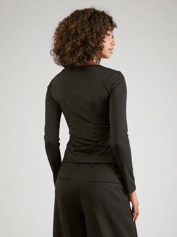 Maglietta 'Piper' di ABOUT YOU in nero