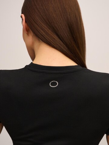 T-shirt 'Easy' ORIMEI by Victoria Swarovski en noir