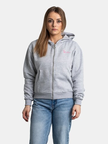 Veste de survêtement Karl Kani en gris : devant