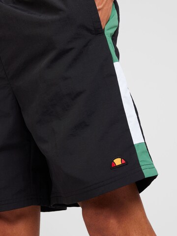 ELLESSE Loose fit Pants 'Tiaki 7' in Black