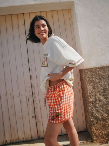 Regular Pantaloni de la Next pe roșu