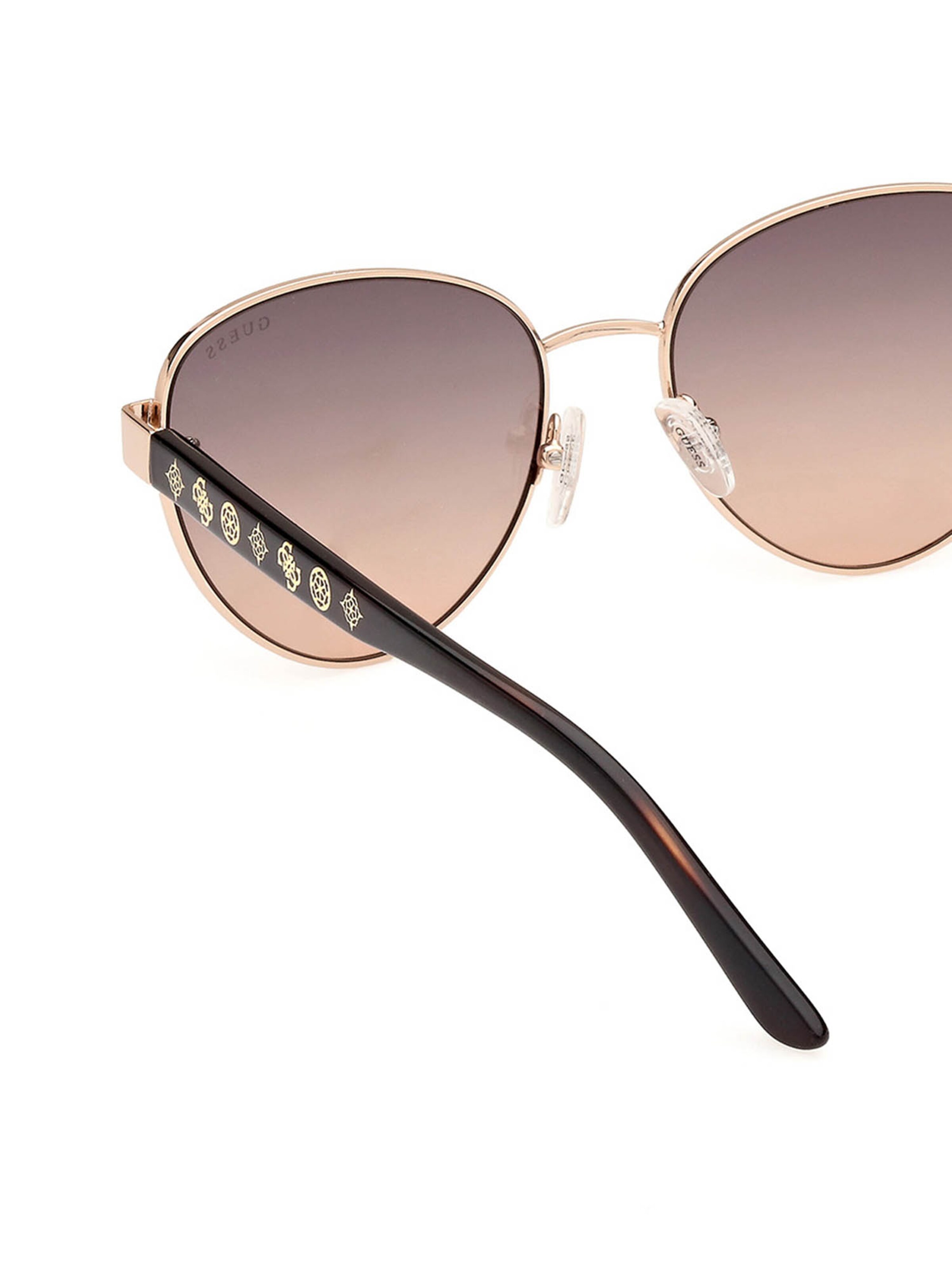 GUESS Sunglasses in Gold