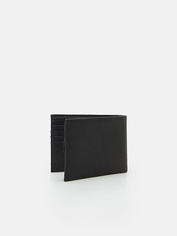 Portamonete di Emporio Armani in nero