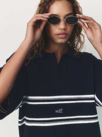 Pull-over self. en bleu