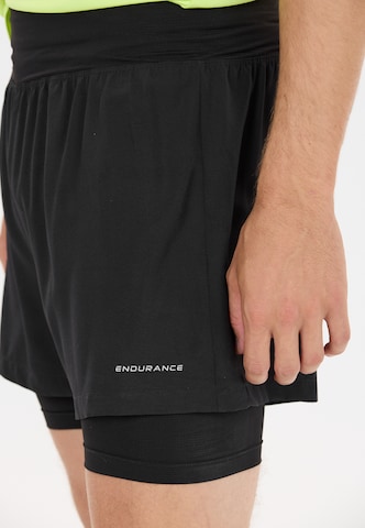 ENDURANCE Regular Sports trousers 'Less' in Black