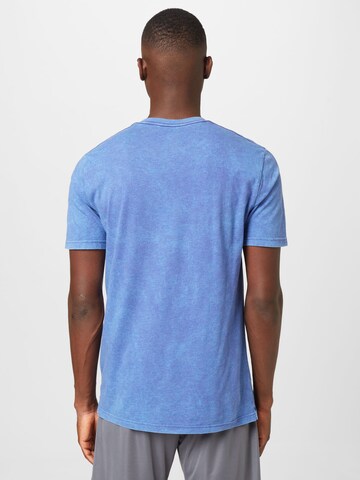 UNDER ARMOUR Funkční tričko – modrá