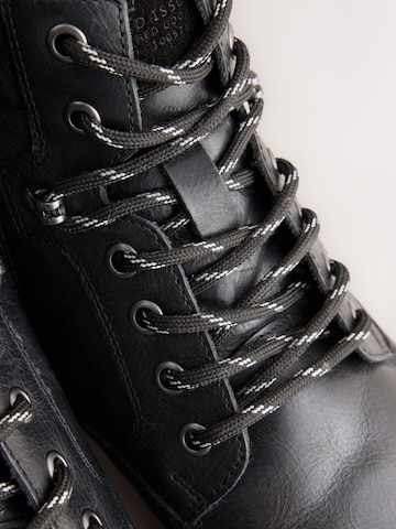 Next - Botas con cordones en negro