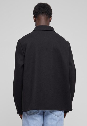 Urban Classics Comfort Fit Φθινοπωρινό και ανοιξιάτικο μπουφάν σε μαύρο
