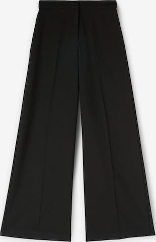 MOTIVI Trousers in Black: front