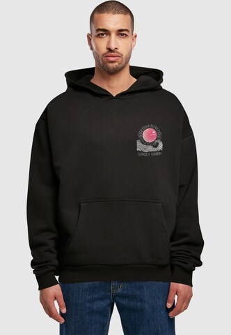 Merchcode - Sudadera 'Sunset Charm' en negro: frente