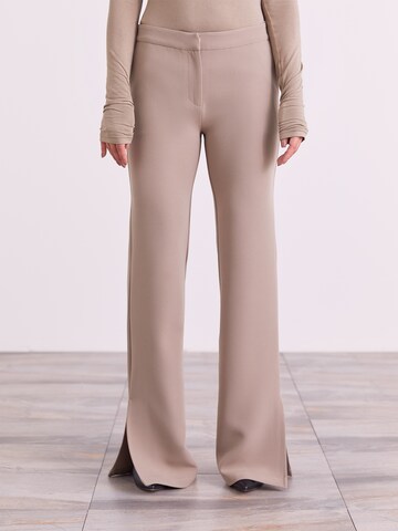 ABOUT YOU x Iconic by Tatiana Kucharova Flared Trousers 'Edina' in Beige: front