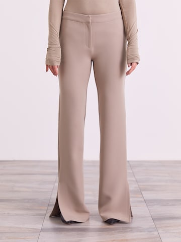ABOUT YOU x Iconic by Tatiana Kucharova Flared Pants 'Edina' in Beige: front