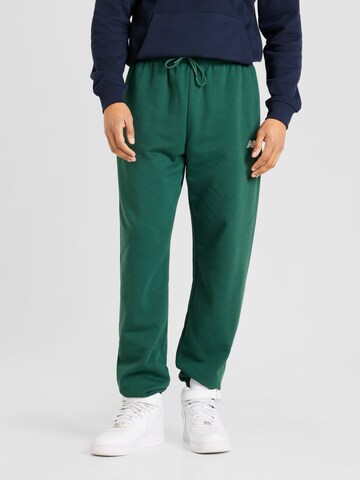 Effilé Pantalon new balance en vert : devant