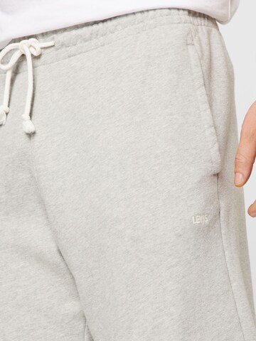 LEVI'S ® Zwężany krój Spodnie 'Authentic Sweatpants' w kolorze beżowy