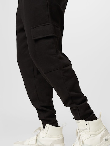 Effilé Pantalon cargo BURTON MENSWEAR LONDON en noir