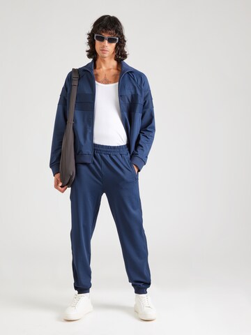 ELLESSE Дънки Tapered Leg Панталон в синьо