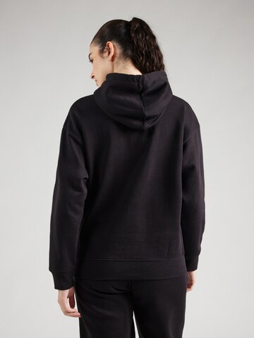 PUMA - Camiseta deportiva 'ESS' en negro