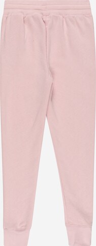 UNDER ARMOUR Workout Pants 'Rival' in Pink