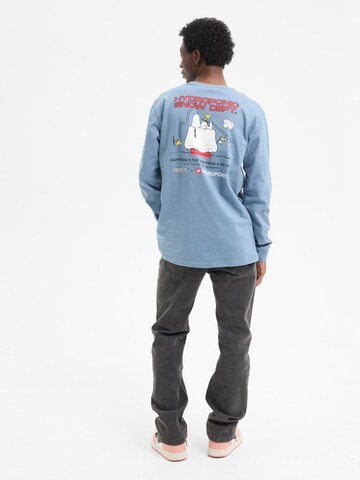 hydroponic - Camiseta 'Hydroponic x Peanuts Regular-Fit Long-Sleeve Ski Lift T-Shirt' en azul