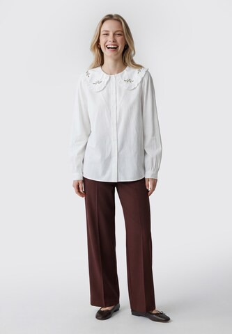 Usha - Blusa en blanco