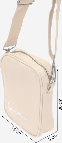 Borsa a tracolla di Karl Kani in beige