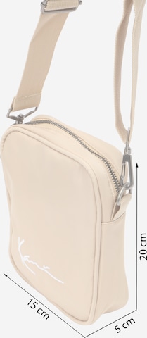 Borsa a tracolla di Karl Kani in beige