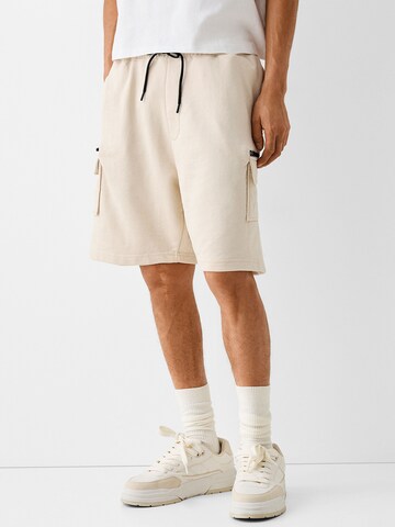 Bershka Loose fit Cargo Pants in Beige