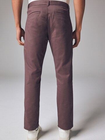 Next Slimfit Chinohousut värissä lila