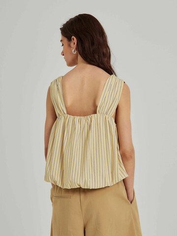 Top di NORR in giallo