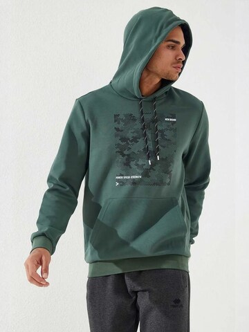 Sweat-shirt Tommy Life en vert