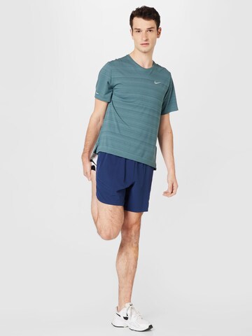 NIKE Regular Urheiluhousut 'SLAM' värissä sininen