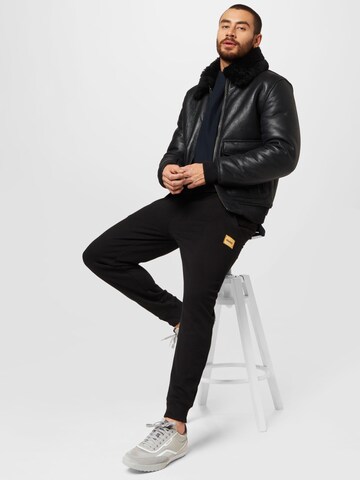 Effilé Pantalon 'Doak' HUGO en noir