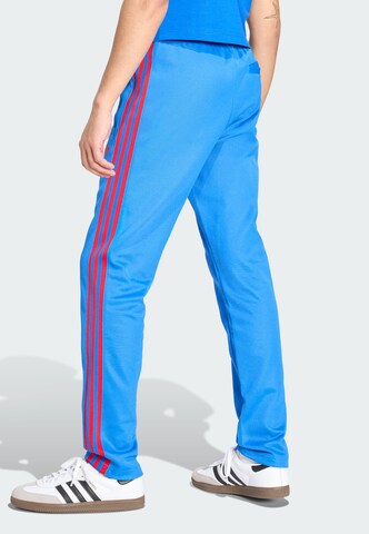 ADIDAS ORIGINALS Slimfit Sportbroek in Blauw