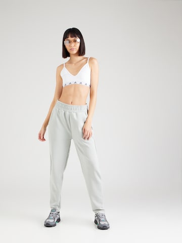 Athlecia - Tapered Pantalón deportivo 'Jillnana' en blanco