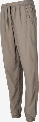 Athlecia Regular Workout Pants 'Tharbia' in Beige