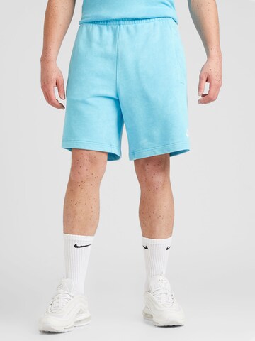 Regular Pantaloni 'CLUB' de la Nike Sportswear pe albastru: față
